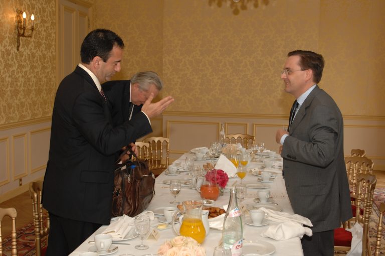Fabien Baussart with U.S. diplomat Philip Gorden.
